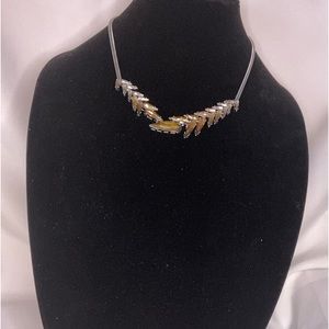 Vera Wang necklace with light brown and greenish stones And silver tone $35